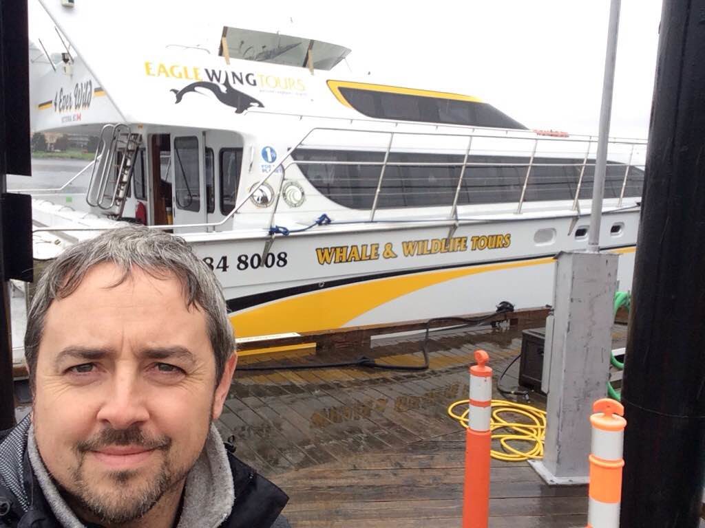 Darrell Eason, Green Tourism Assessor, checking out Eagle Wing Tour's latest boat, a catamaran called 4 Ever Wild