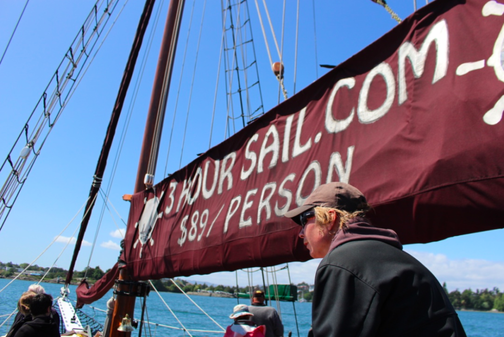 Banjo Pete steering A Tall Ship Thane